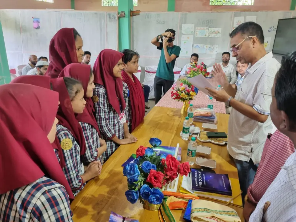 Students with the HOD of Physics, AUS